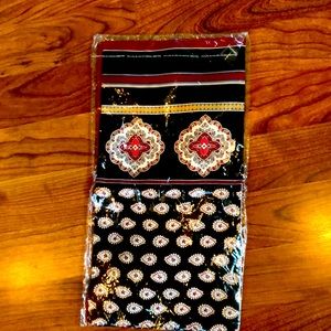 Vera Bradley scarf. New and sealed. 26”x28” approx. Black red and gold.